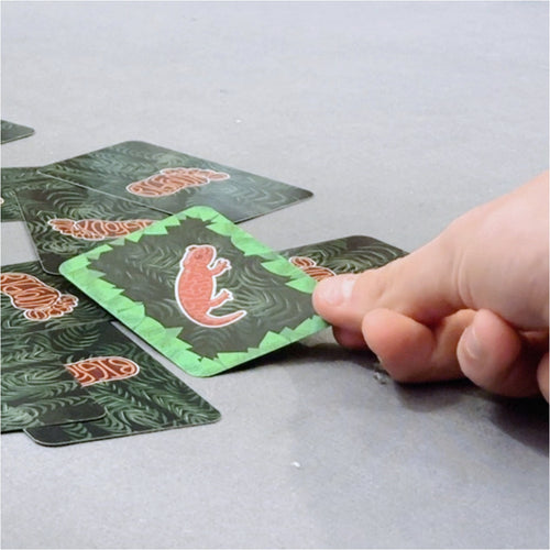 Bigfoot Twins travel card game, gameplay turning over a card